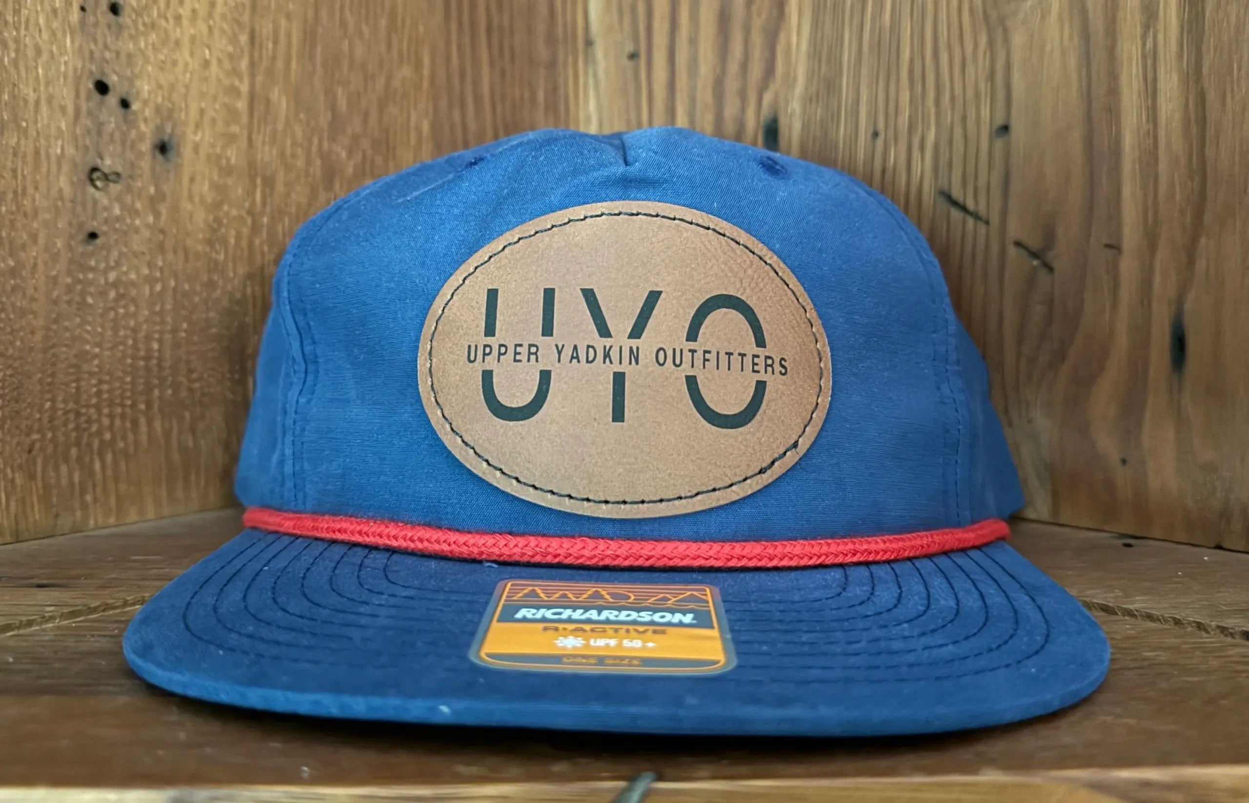 UYO-Upper Yadkin Outfitters hat with wooden background